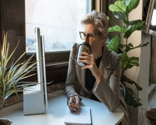 person taking a short coffee break during a workday
